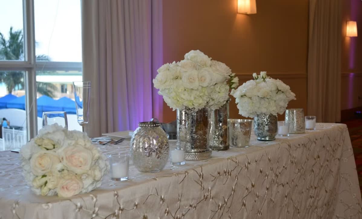 Bride and groom table flowers by Tropical Arrangements, Randallstown MD