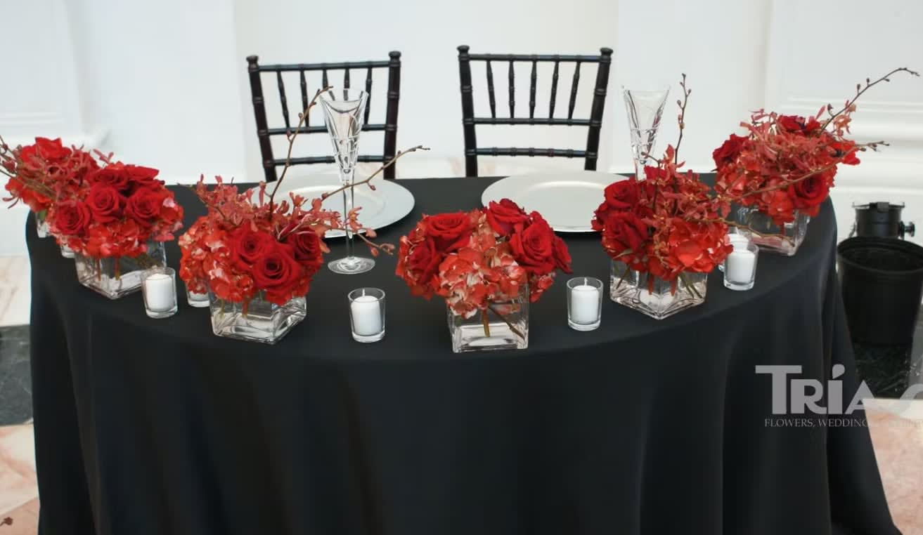 Bride and groom table flowers by Tropical Arrangements, Randallstown MD