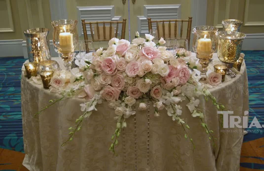 Bride and groom table flowers by Tropical Arrangements, Randallstown MD