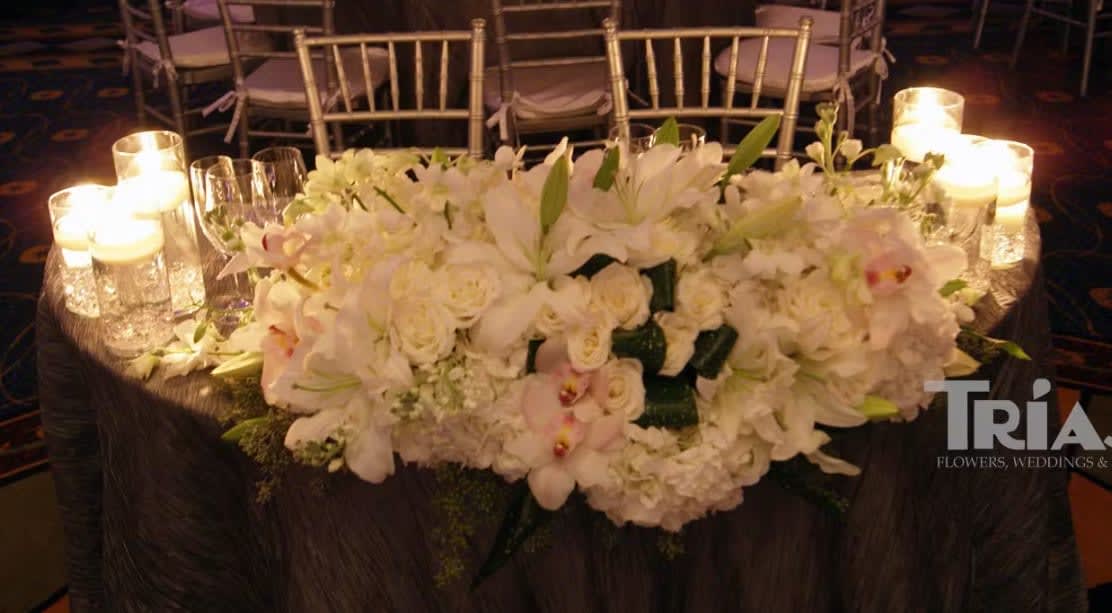 Bride and groom table flowers by Tropical Arrangements, Randallstown MD