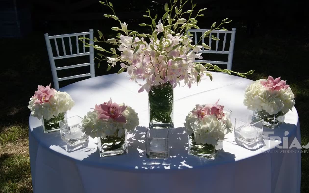 Bride and groom table flowers by Tropical Arrangements, Randallstown MD