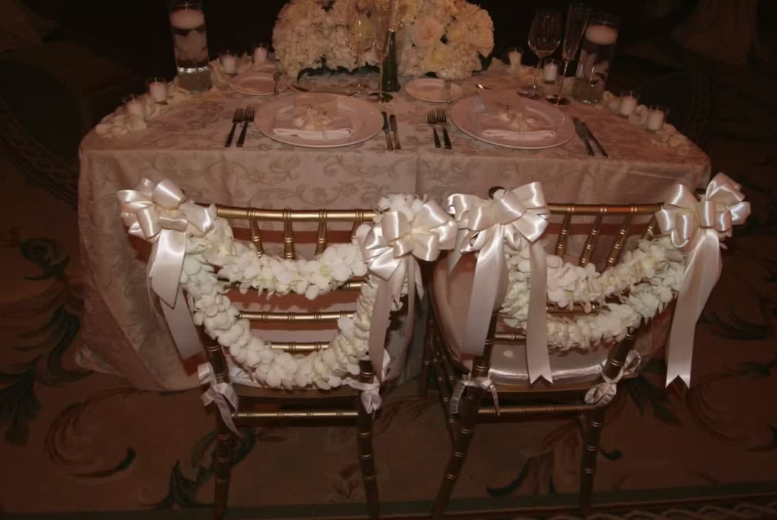 Bride and groom table flowers by Tropical Arrangements, Randallstown MD