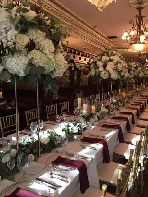 Bride and groom table flowers by Tropical Arrangements, Randallstown MD