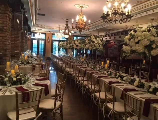 Bride and groom table flowers by Tropical Arrangements, Randallstown MD