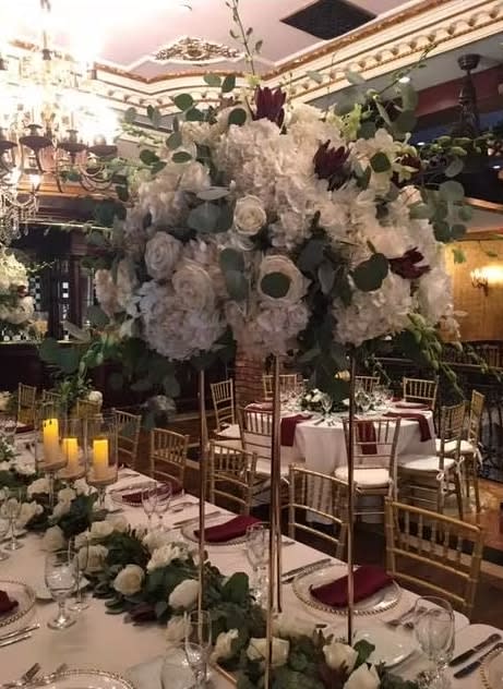 Bride and groom table flowers by Tropical Arrangements, Randallstown MD