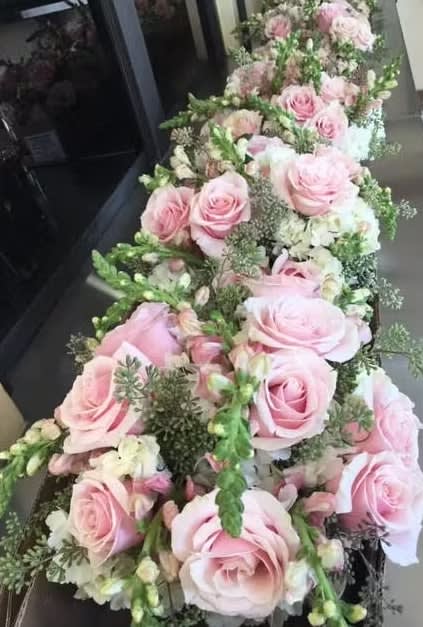 Bride and groom table flowers by Tropical Arrangements, Randallstown MD