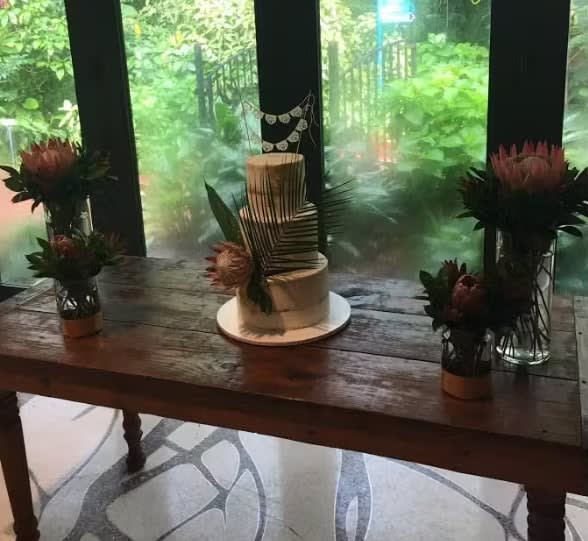 Bride and groom table flowers by Tropical Arrangements, Randallstown MD