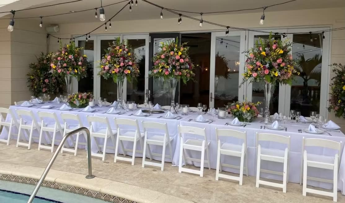 Bride and groom table flowers by Tropical Arrangements, Randallstown MD