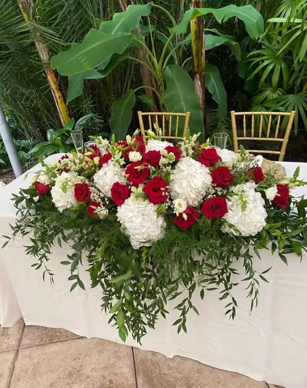 Bride and groom table flowers by Tropical Arrangements, Randallstown MD