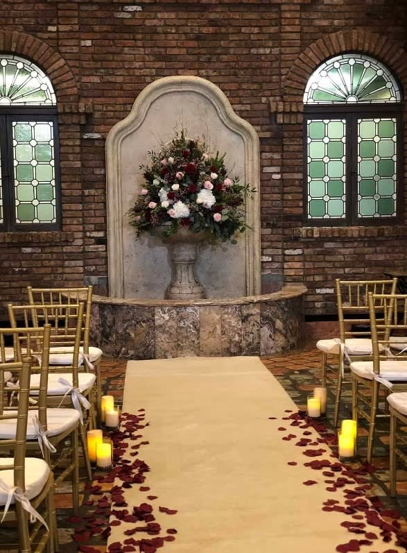 Wedding arch and altar flowers by Tropical Arrangements, Randallstown MD