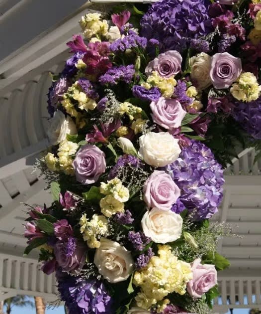 Wedding arch and altar flowers by Tropical Arrangements, Randallstown MD