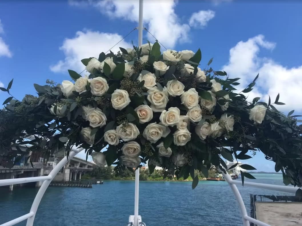 Wedding arch and altar flowers by Tropical Arrangements, Randallstown MD