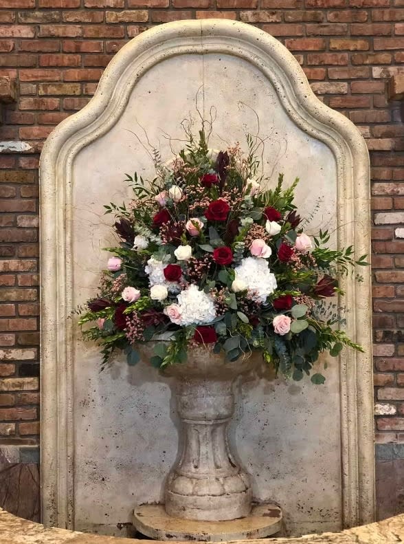 Wedding arch and altar flowers by Tropical Arrangements, Randallstown MD