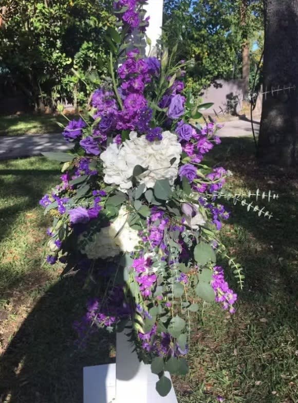 Wedding arch and altar flowers by Tropical Arrangements, Randallstown MD