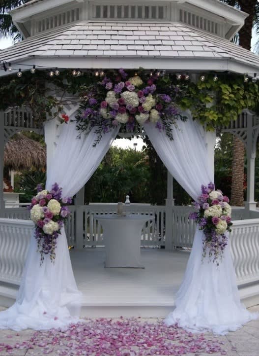 Wedding arch and altar flowers by Tropical Arrangements, Randallstown MD