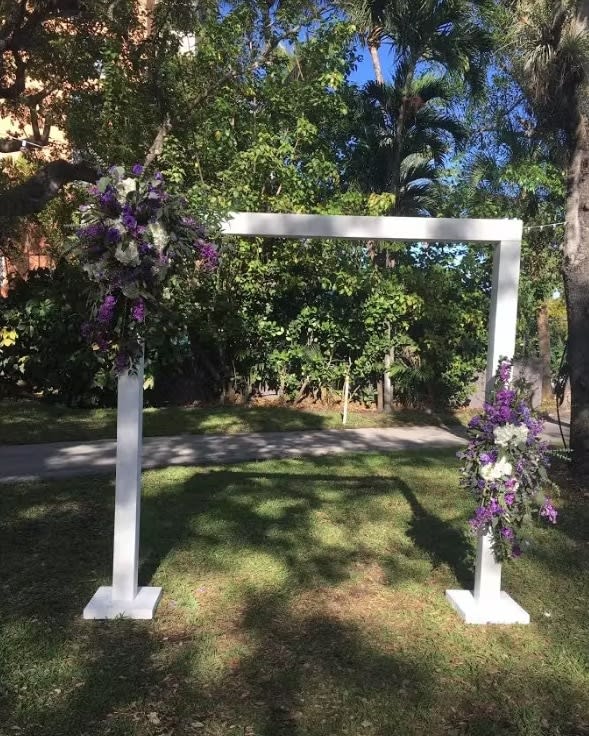 Wedding arch and altar flowers by Tropical Arrangements, Randallstown MD