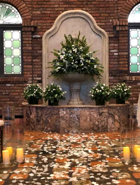 Wedding arch and altar flowers by Tropical Arrangements, Randallstown MD