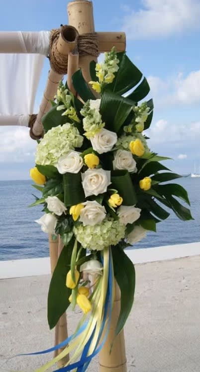 Wedding arch and altar flowers by Tropical Arrangements, Randallstown MD