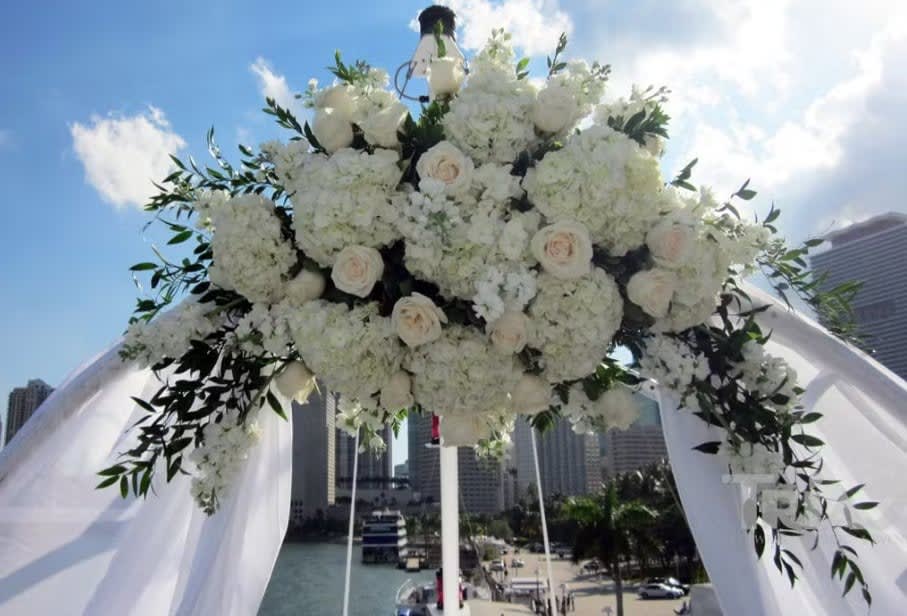 Wedding arch and altar flowers by Tropical Arrangements, Randallstown MD