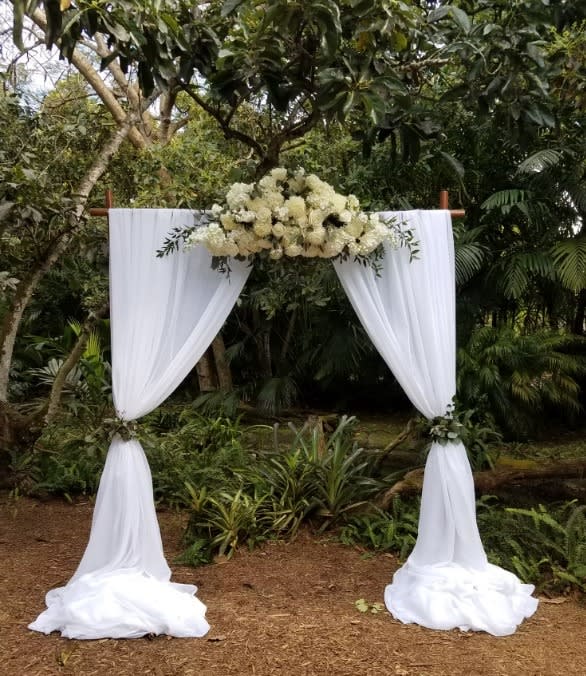 Wedding arch and altar flowers by Tropical Arrangements, Randallstown MD