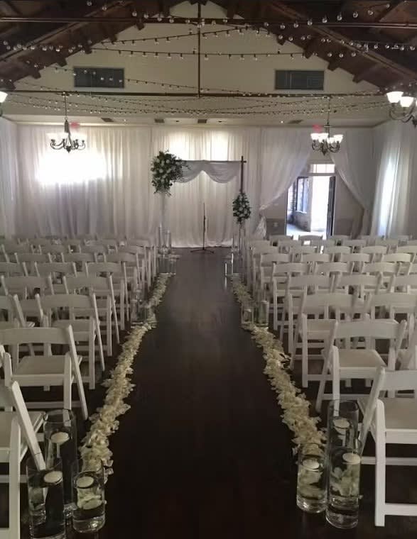 Wedding arch and altar flowers by Tropical Arrangements, Randallstown MD