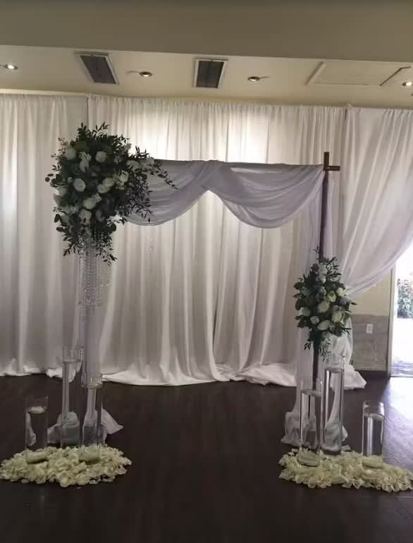 Wedding arch and altar flowers by Tropical Arrangements, Randallstown MD