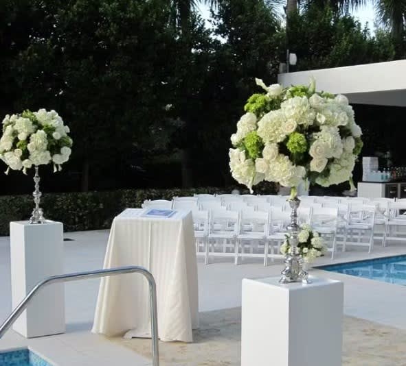 Wedding arch and altar flowers by Tropical Arrangements, Randallstown MD