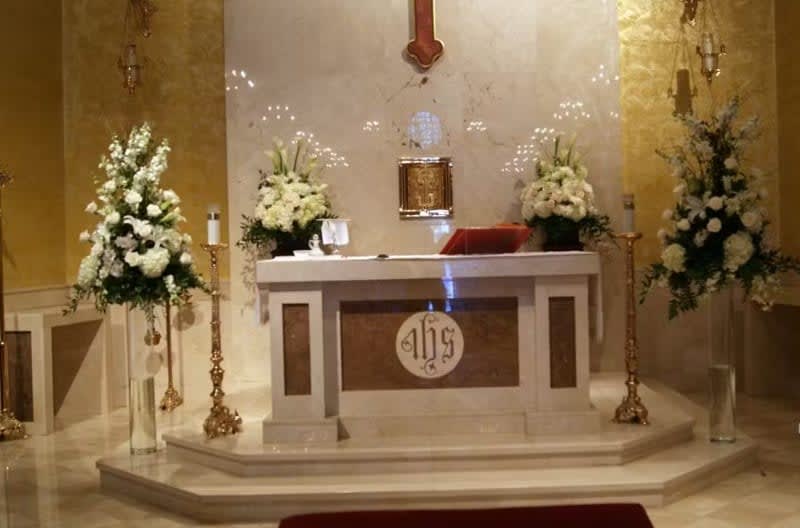 Wedding arch and altar flowers by Tropical Arrangements, Randallstown MD