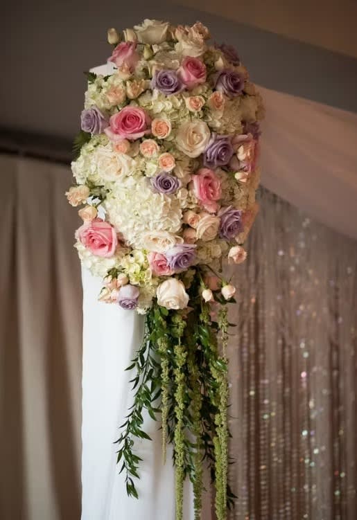 Wedding arch and altar flowers by Tropical Arrangements, Randallstown MD