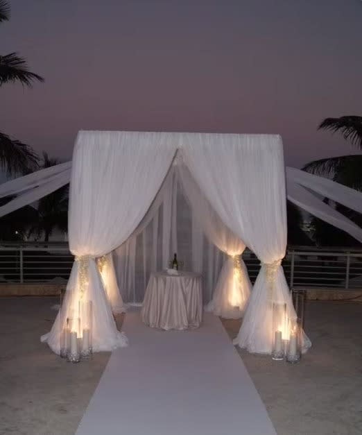 Wedding arch and altar flowers by Tropical Arrangements, Randallstown MD