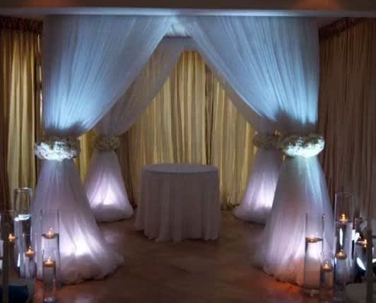 Wedding arch and altar flowers by Tropical Arrangements, Randallstown MD