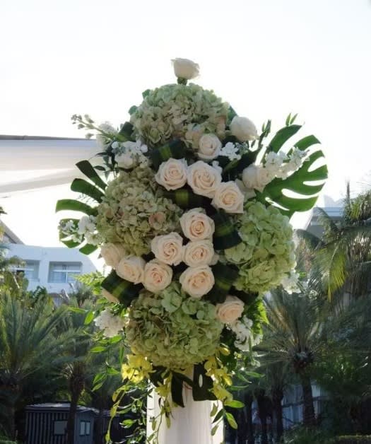 Wedding arch and altar flowers by Tropical Arrangements, Randallstown MD