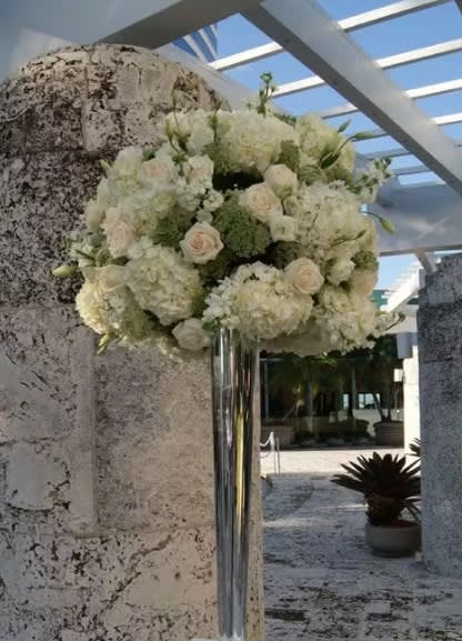 Wedding arch and altar flowers by Tropical Arrangements, Randallstown MD