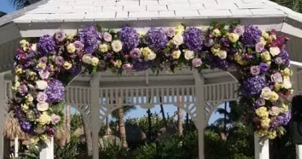 Wedding arch and altar flowers by Tropical Arrangements, Randallstown MD