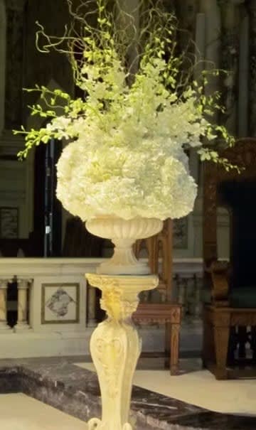 Wedding arch and altar flowers by Tropical Arrangements, Randallstown MD