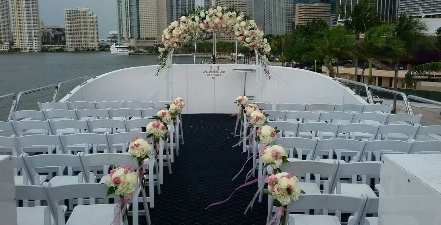 Wedding arch and altar flowers by Tropical Arrangements, Randallstown MD