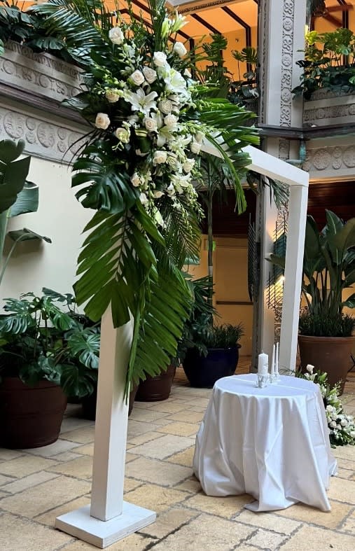 Wedding arch and altar flowers by Tropical Arrangements, Randallstown MD