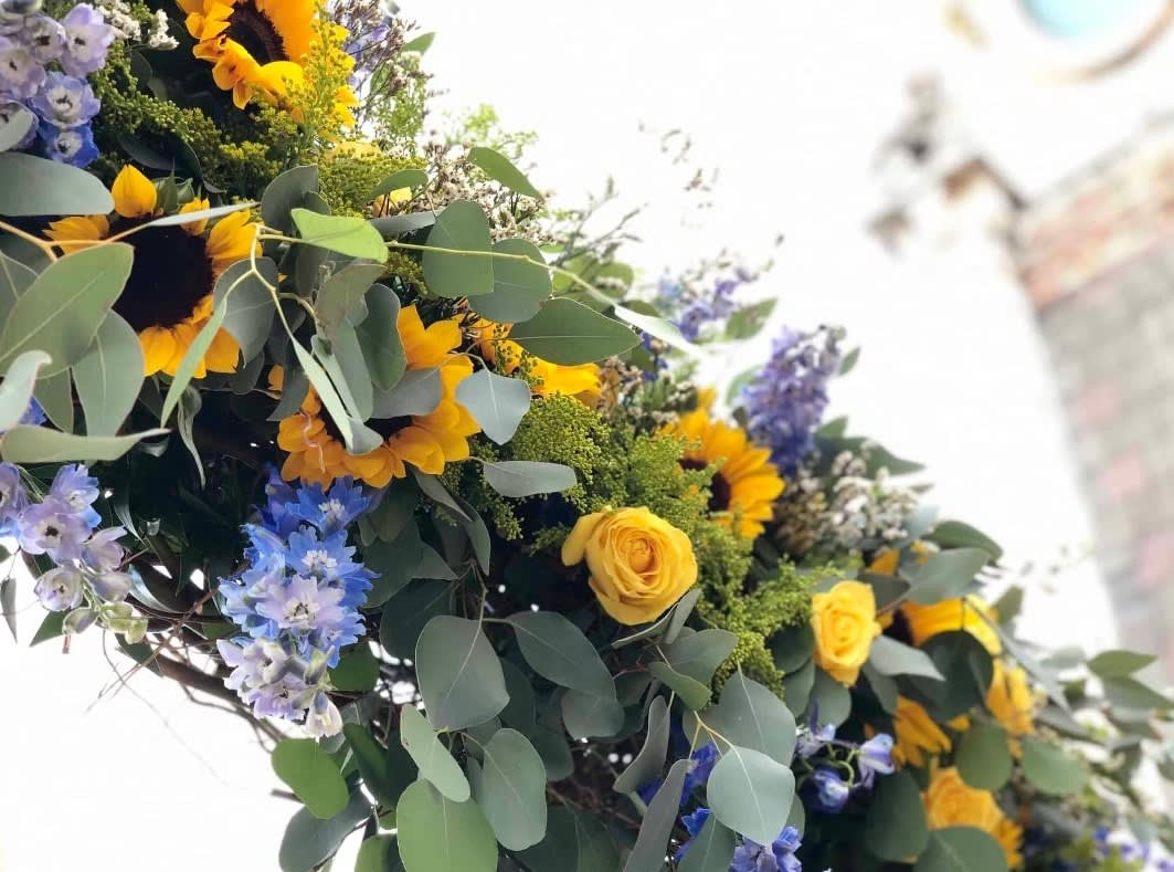Wedding arch and altar flowers by Tropical Arrangements, Randallstown MD