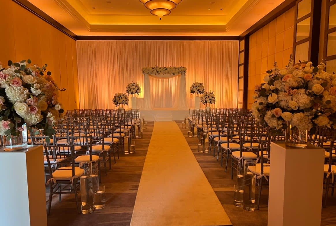 Wedding arch and altar flowers by Tropical Arrangements, Randallstown MD