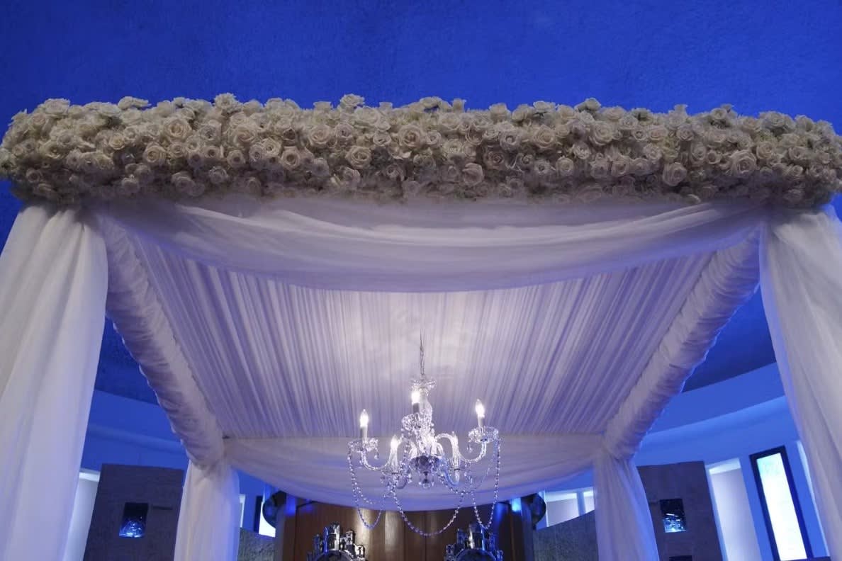 Wedding arch and altar flowers by Tropical Arrangements, Randallstown MD