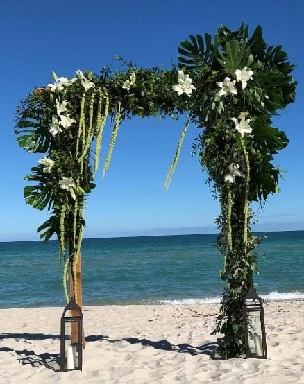 Wedding arch and altar flowers by Tropical Arrangements, Randallstown MD