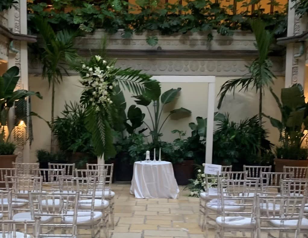 Wedding arch and altar flowers by Tropical Arrangements, Randallstown MD