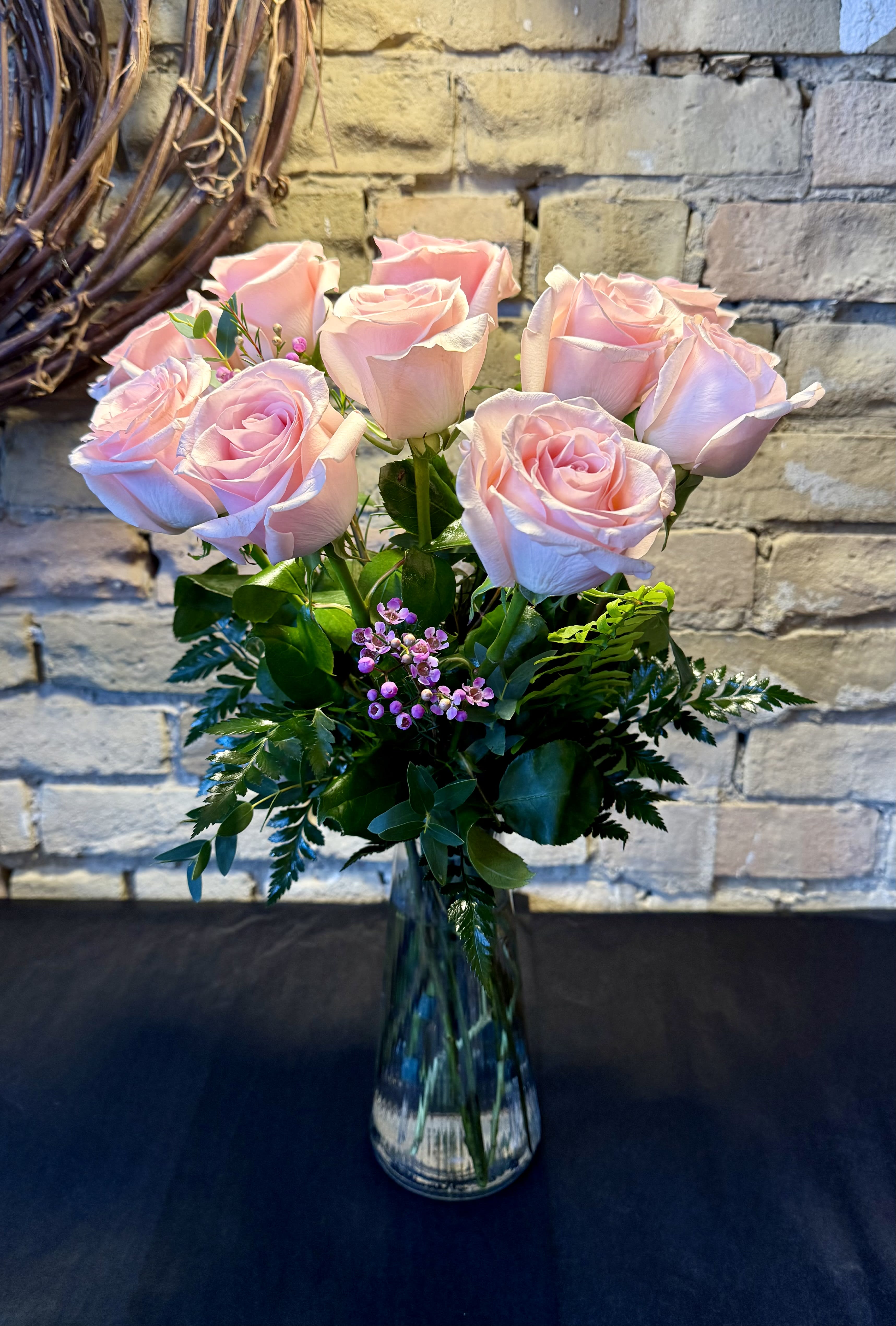 12 Premium long stem Pink Roses in a vase