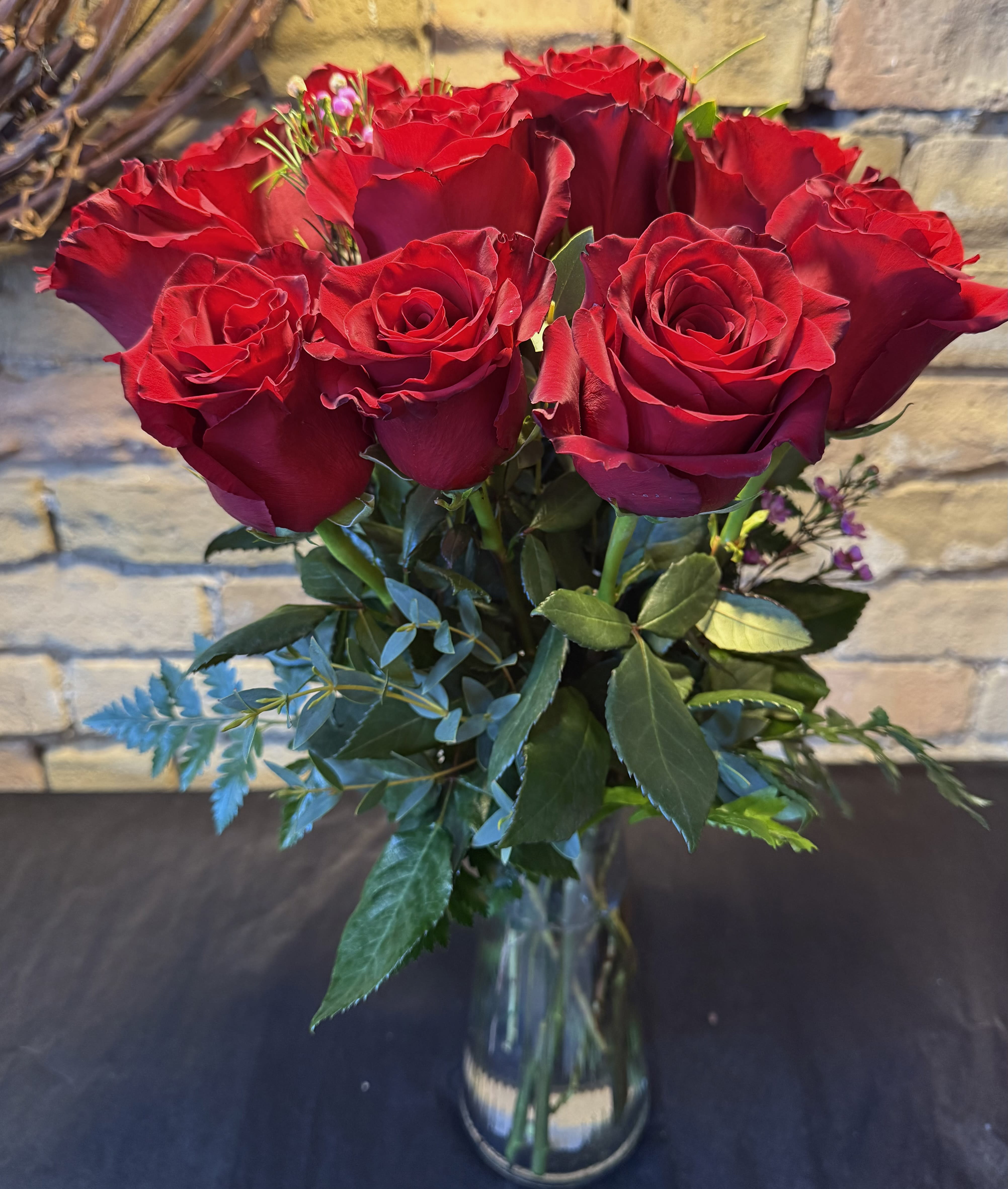12 Premium long stem Red Roses in a vase