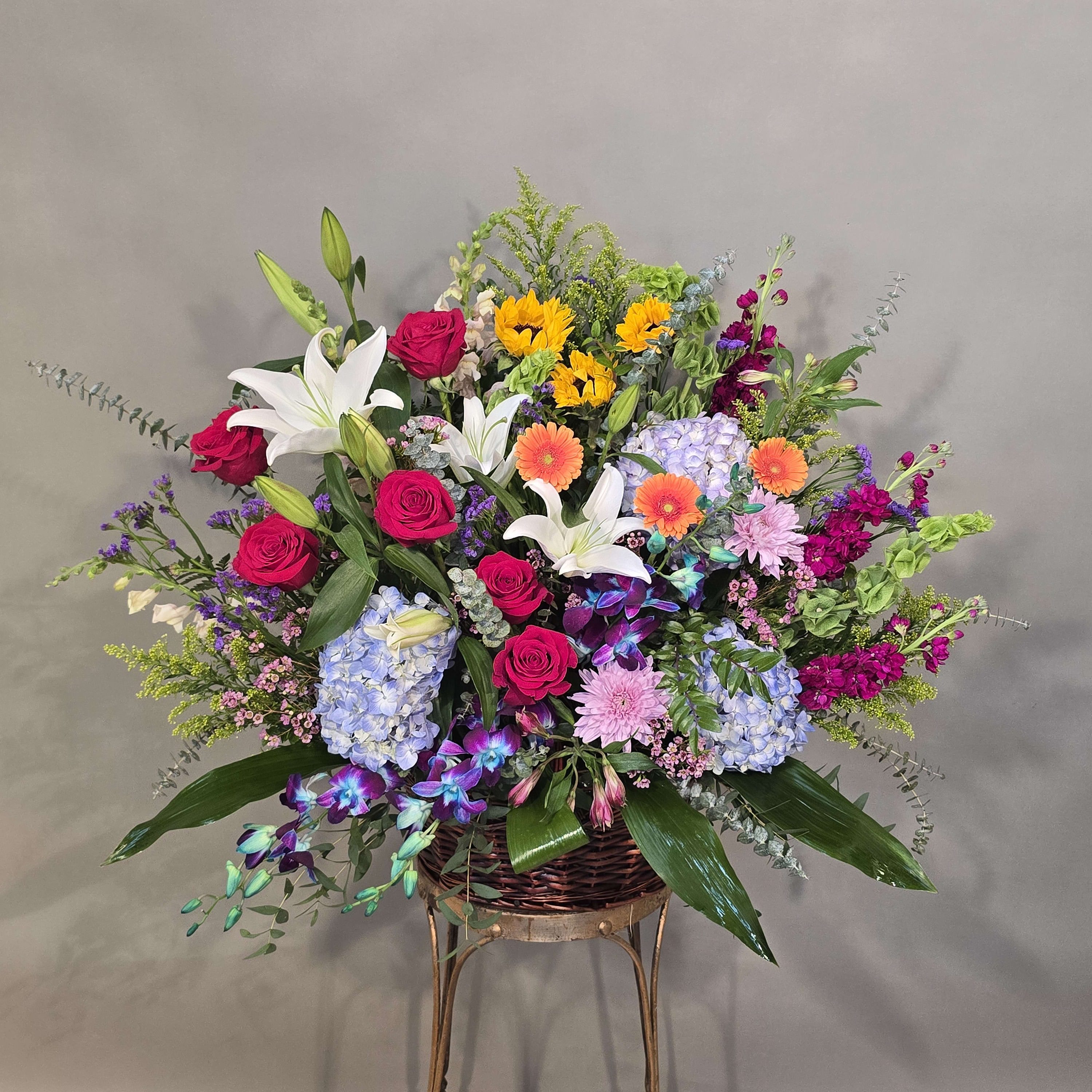 ASSORTED LUSH BASKET OF FLOWERS