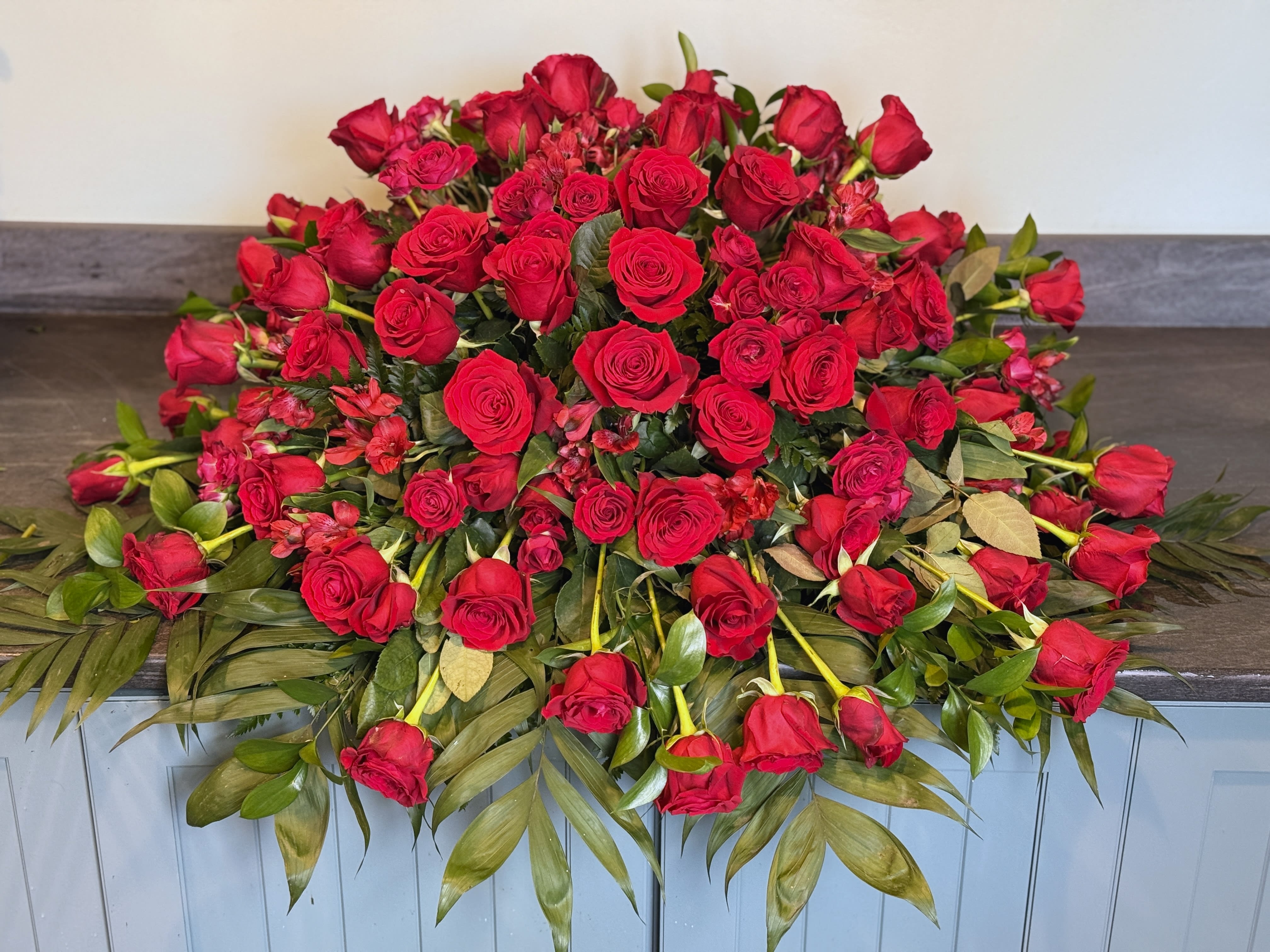 Cherished Memories Red Rose Casket Spray