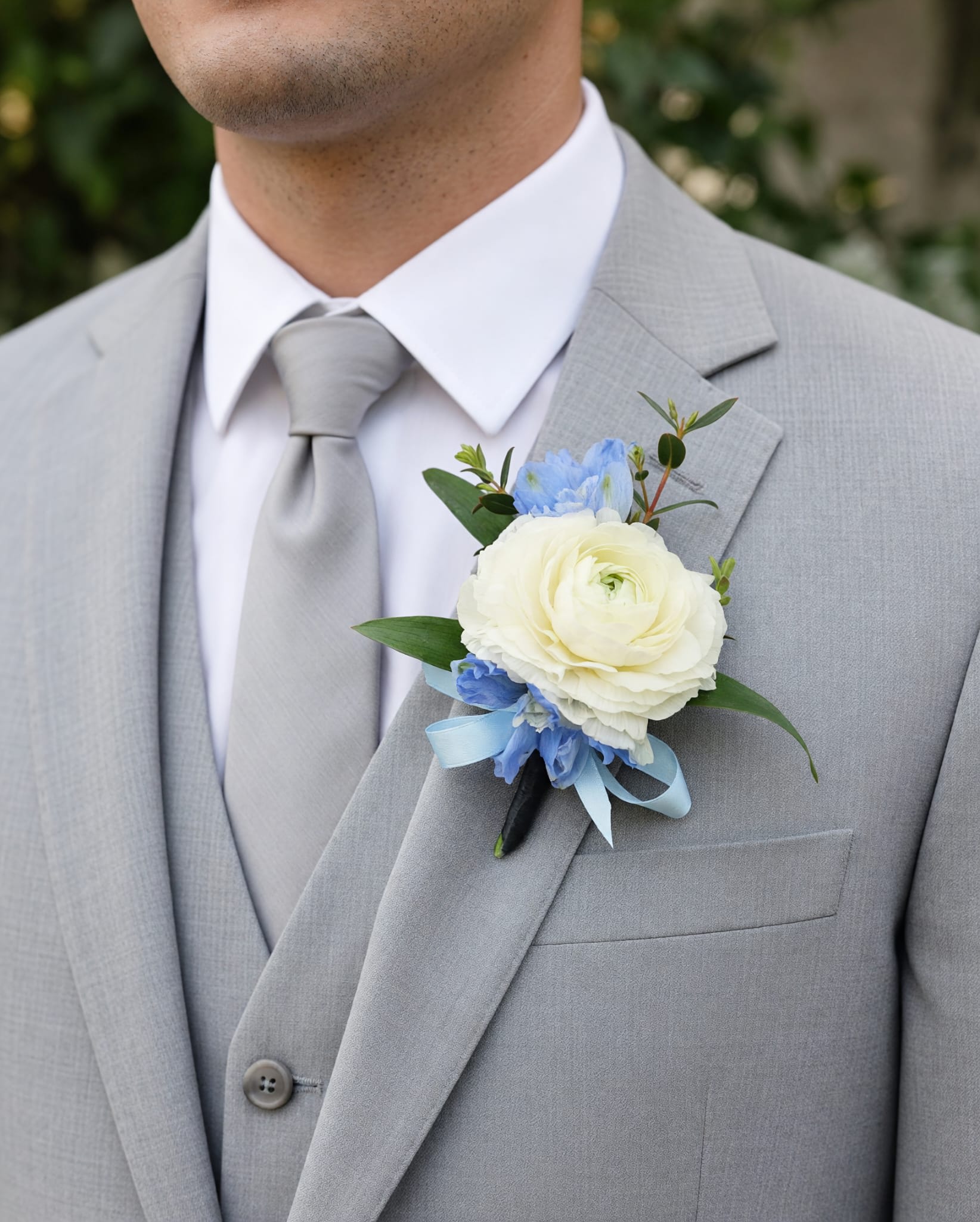 White Ranunculus & Pale Blue Boutonniere