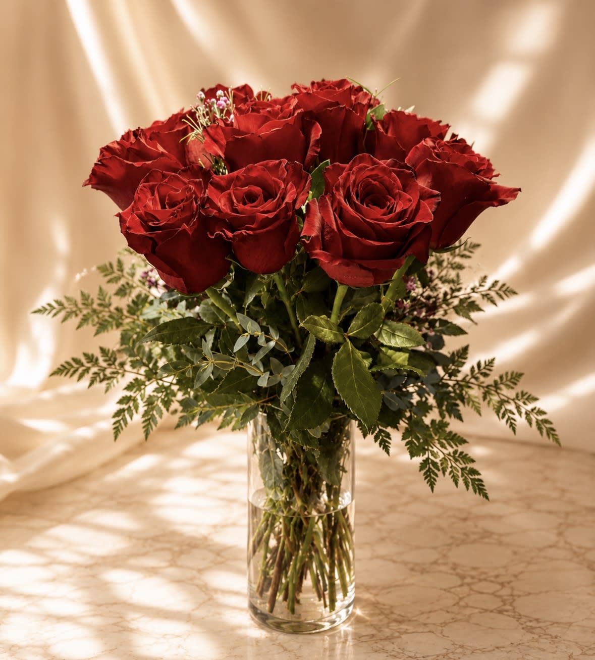 12 Premium long stem Red Roses in a vase
