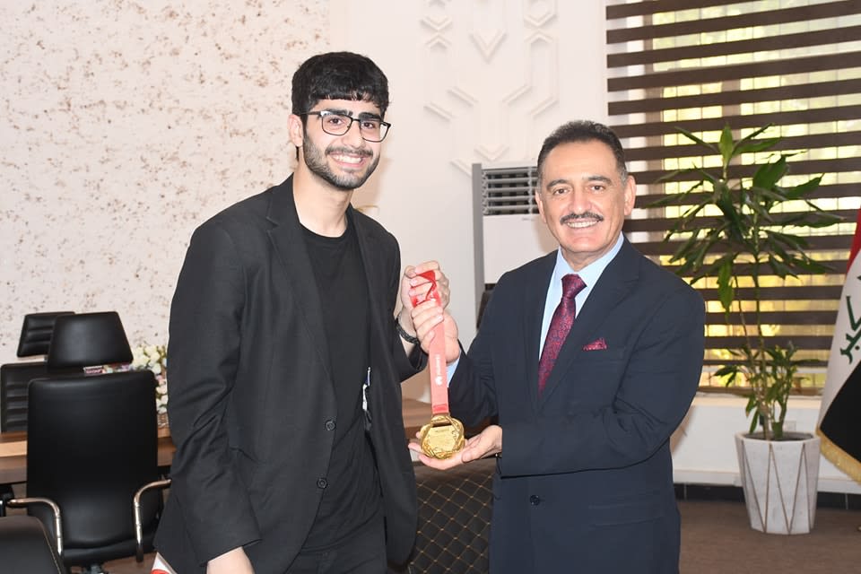 Adil and Kossay Alahmady holding Huawei first prize medal