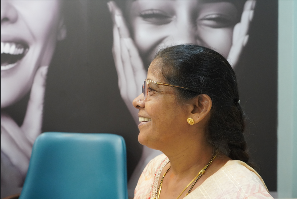 After full mouth implants smiling female patient 3 days result India